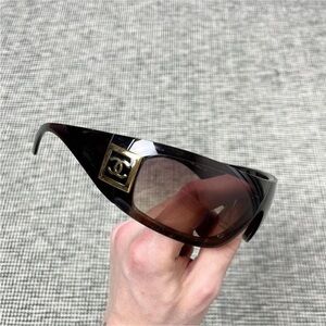 CHANEL Black Sunglasses with Gold Logo